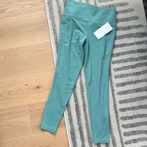Athleta salutation stash 7/8 tight TALL